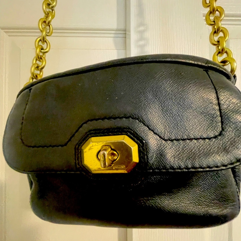 Coach camera bag black and gold cross body